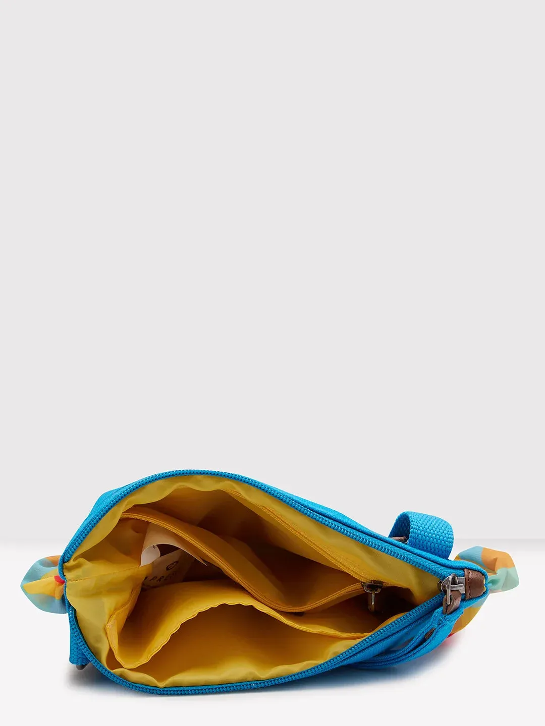 Caprese Oakley Medium Turquoise Sling Bag