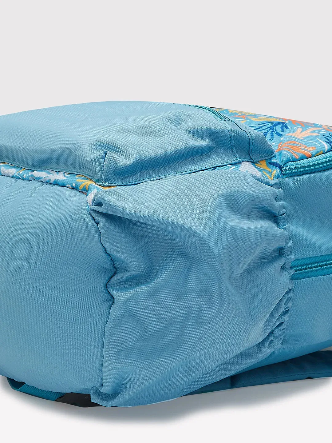 Caprese Xenia Medium Light Blue Printed Backpack