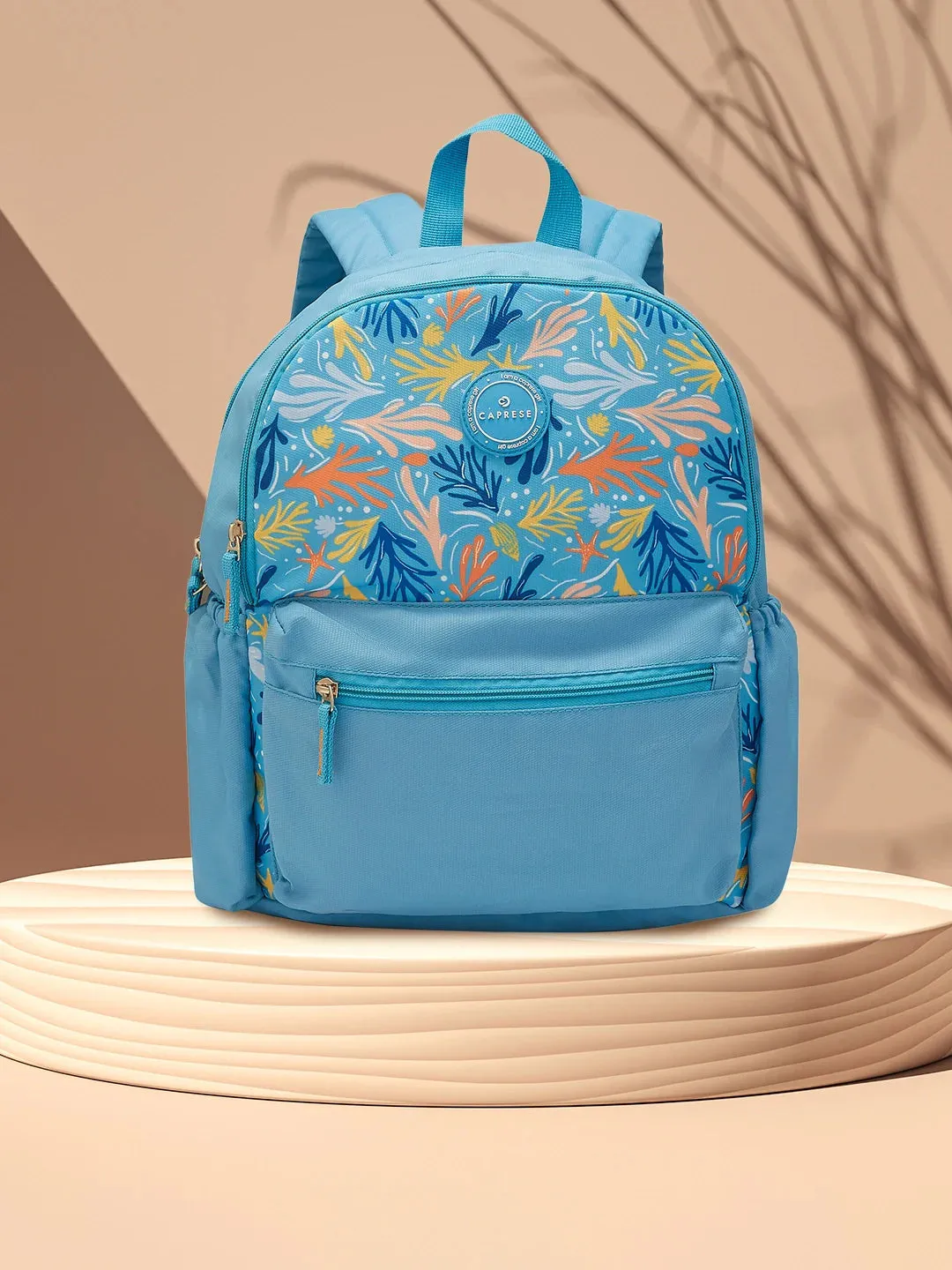 Caprese Xenia Medium Light Blue Printed Backpack