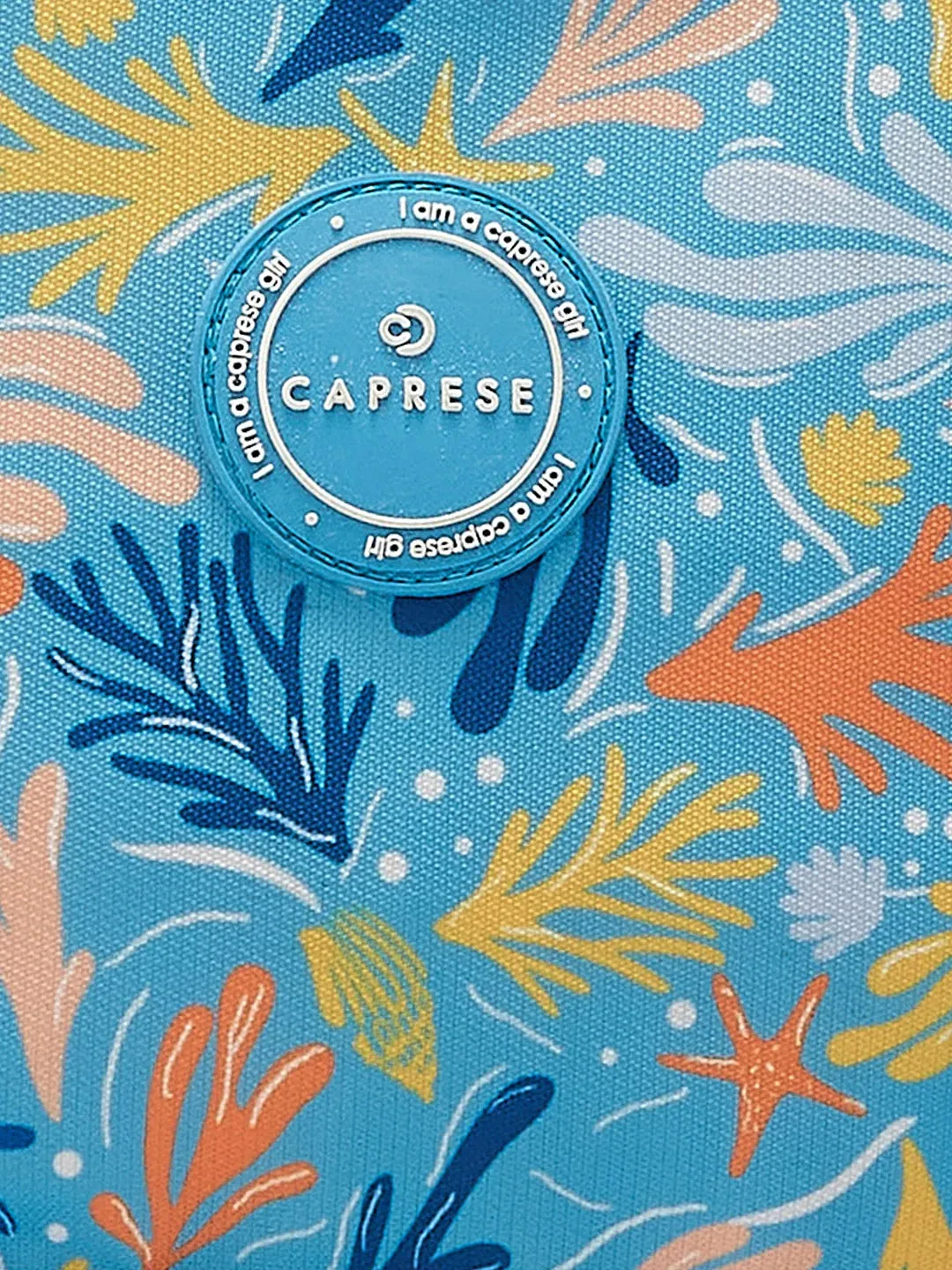 Caprese Xenia Medium Light Blue Printed Backpack