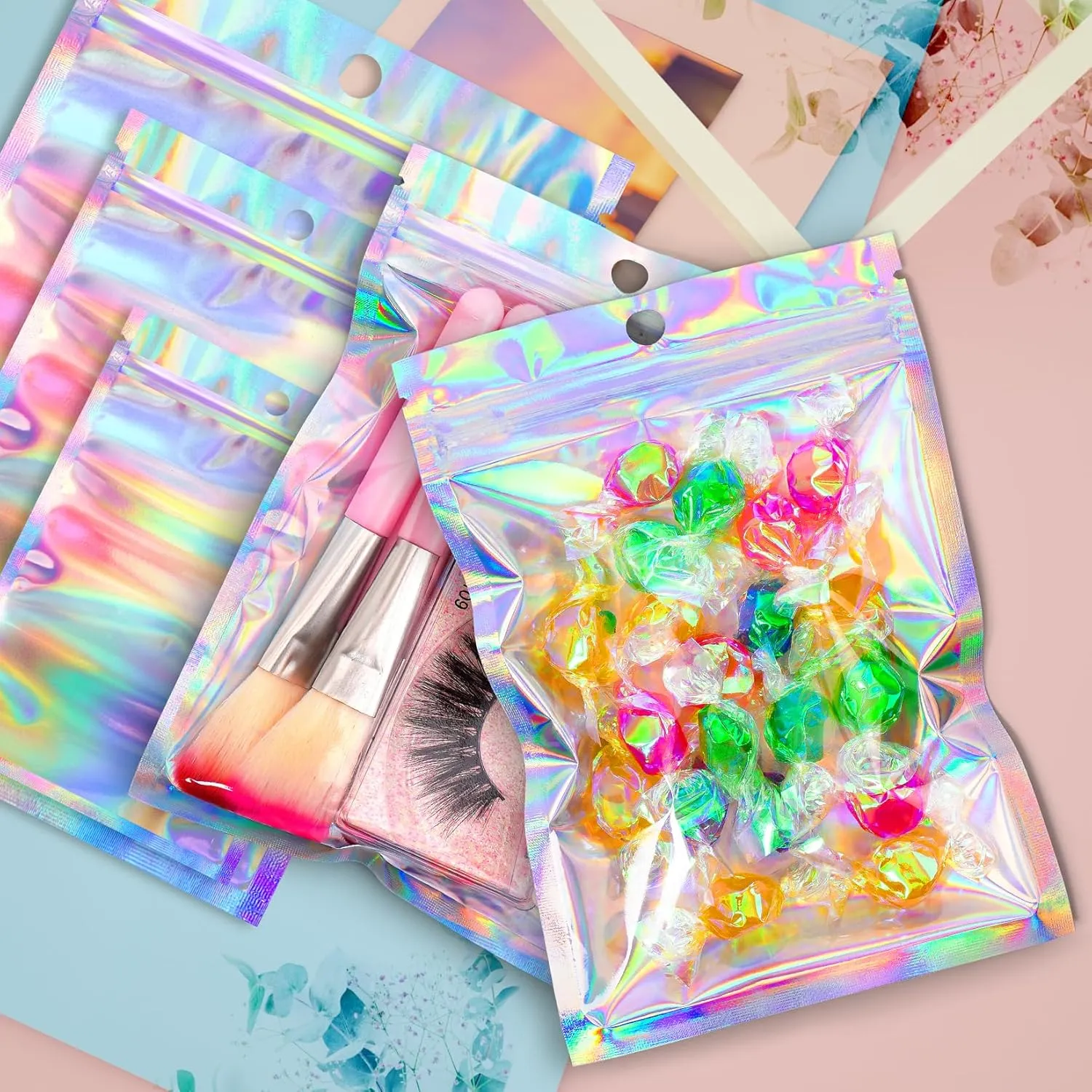Funfery 100 pcs Mylar Holographic Bags Packaging Bags,Clear Resealable Smell Proof Bag Foil Pouch Bag for Party Favor,Food Storage Baggies Packaging for Small Business(6.3x9.4in,Holographic)