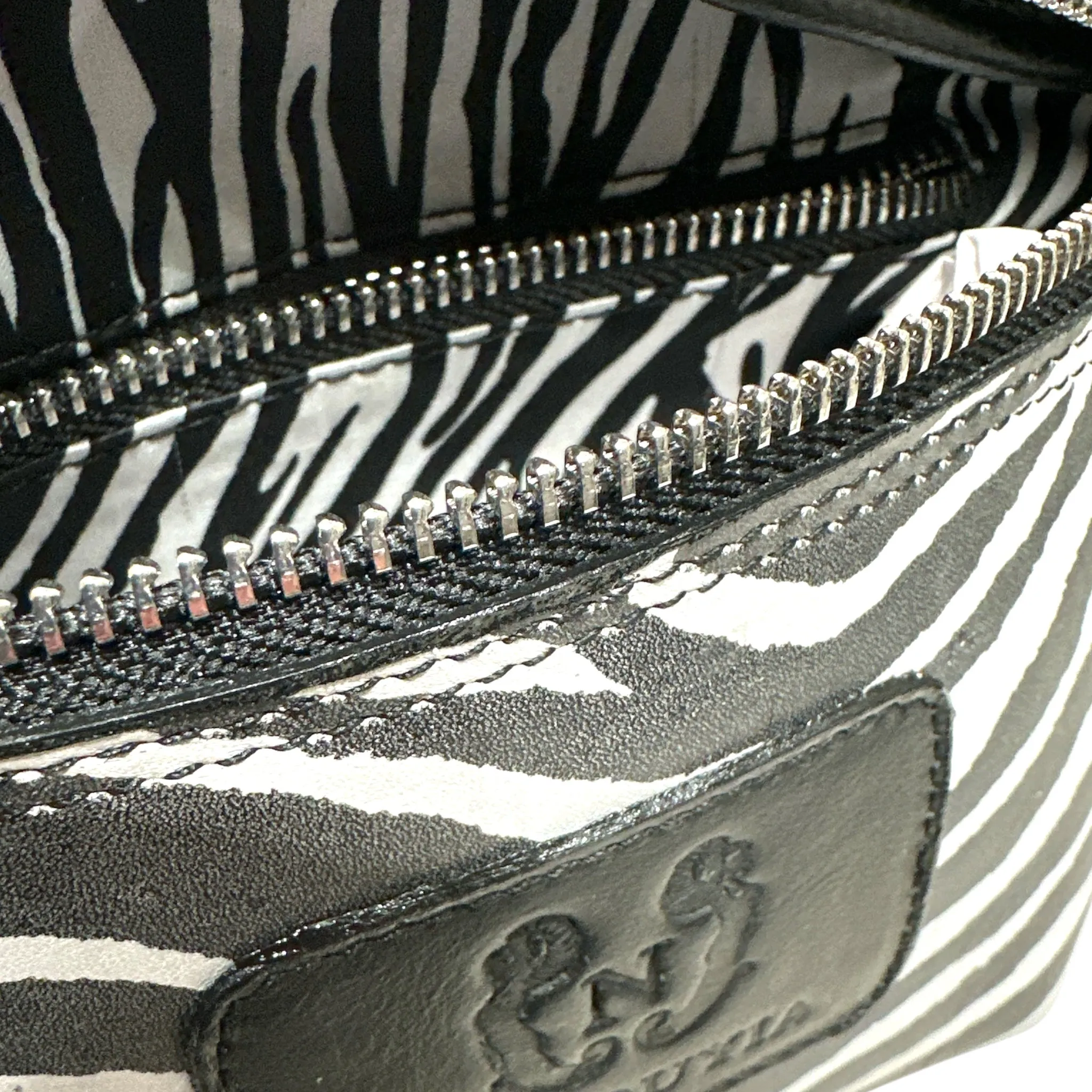 MINI. BLACK ZEBRA-PRINT LEATHER BELT BAG